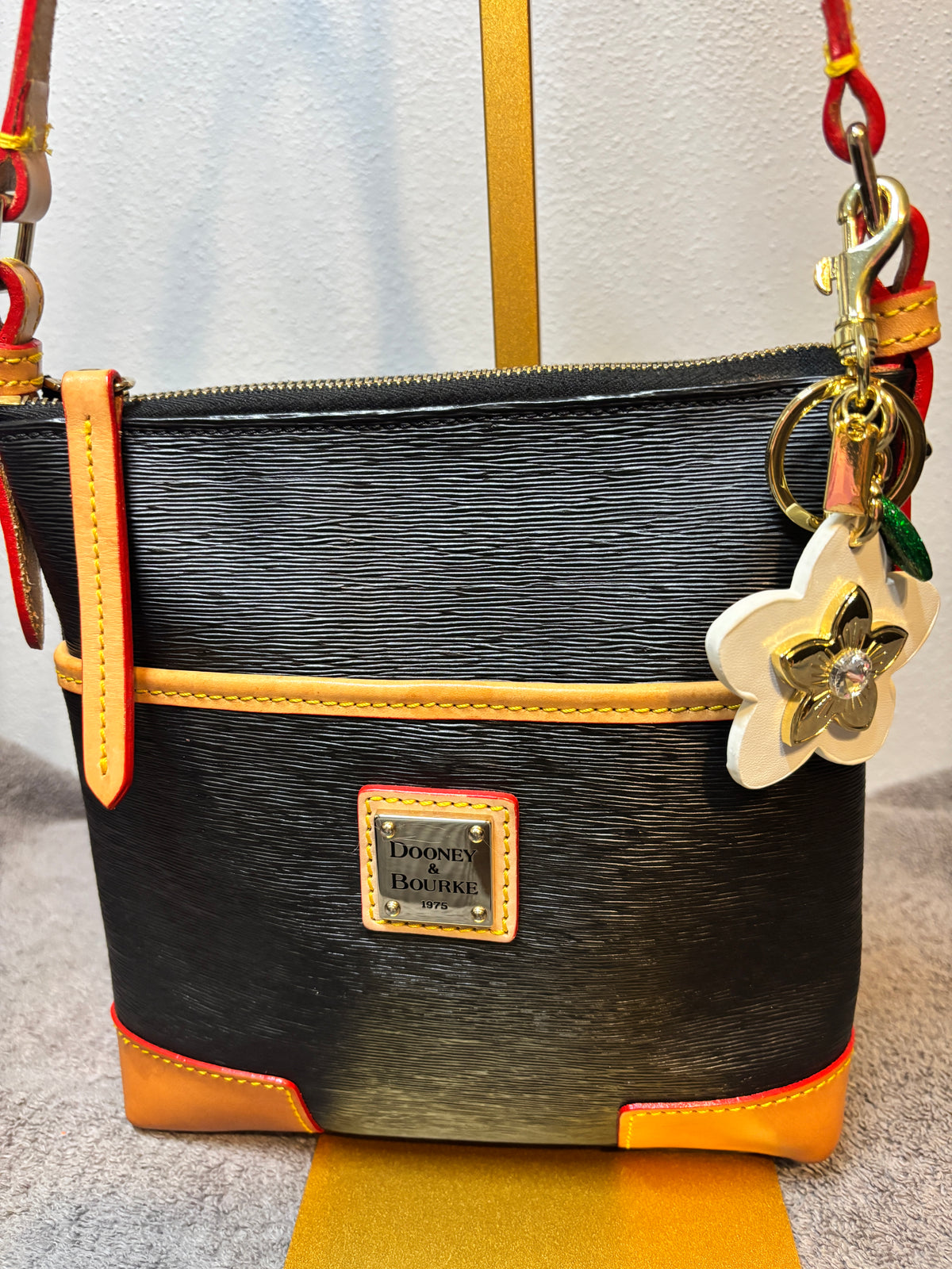 Dooney Bourke fine striated leather Small Everyday Crossbody Black Tan Leather