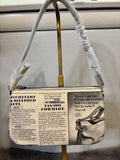 COACH NEWSPAPER NOLITA 19