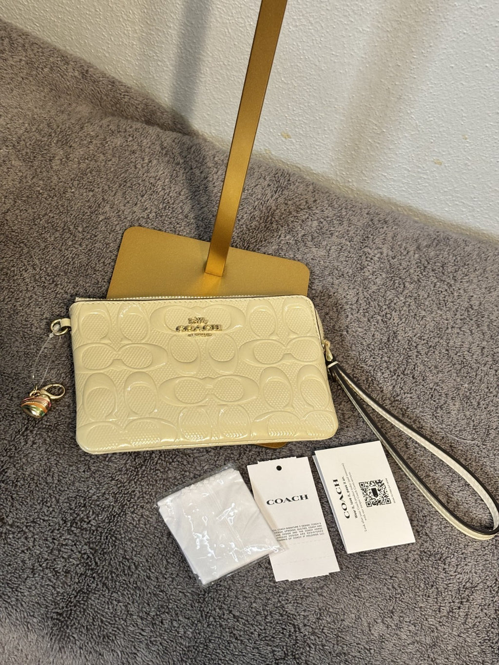 COACH PATENT WHITE WRISTLETS w/ charm NWT