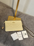 COACH PATENT WHITE WRISTLETS w/ charm NWT