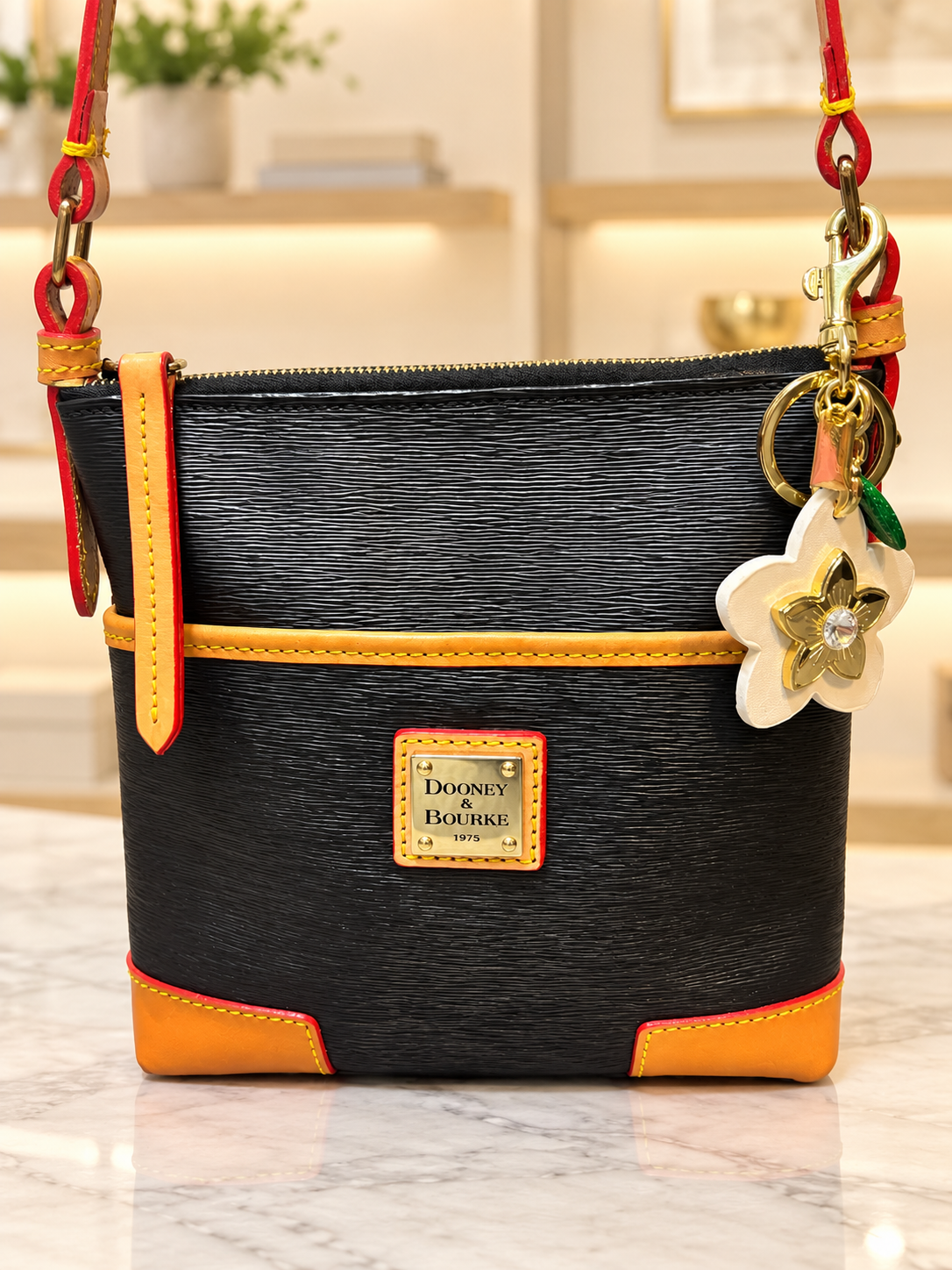 Dooney Bourke fine striated leather Small Everyday Crossbody Black Tan Leather