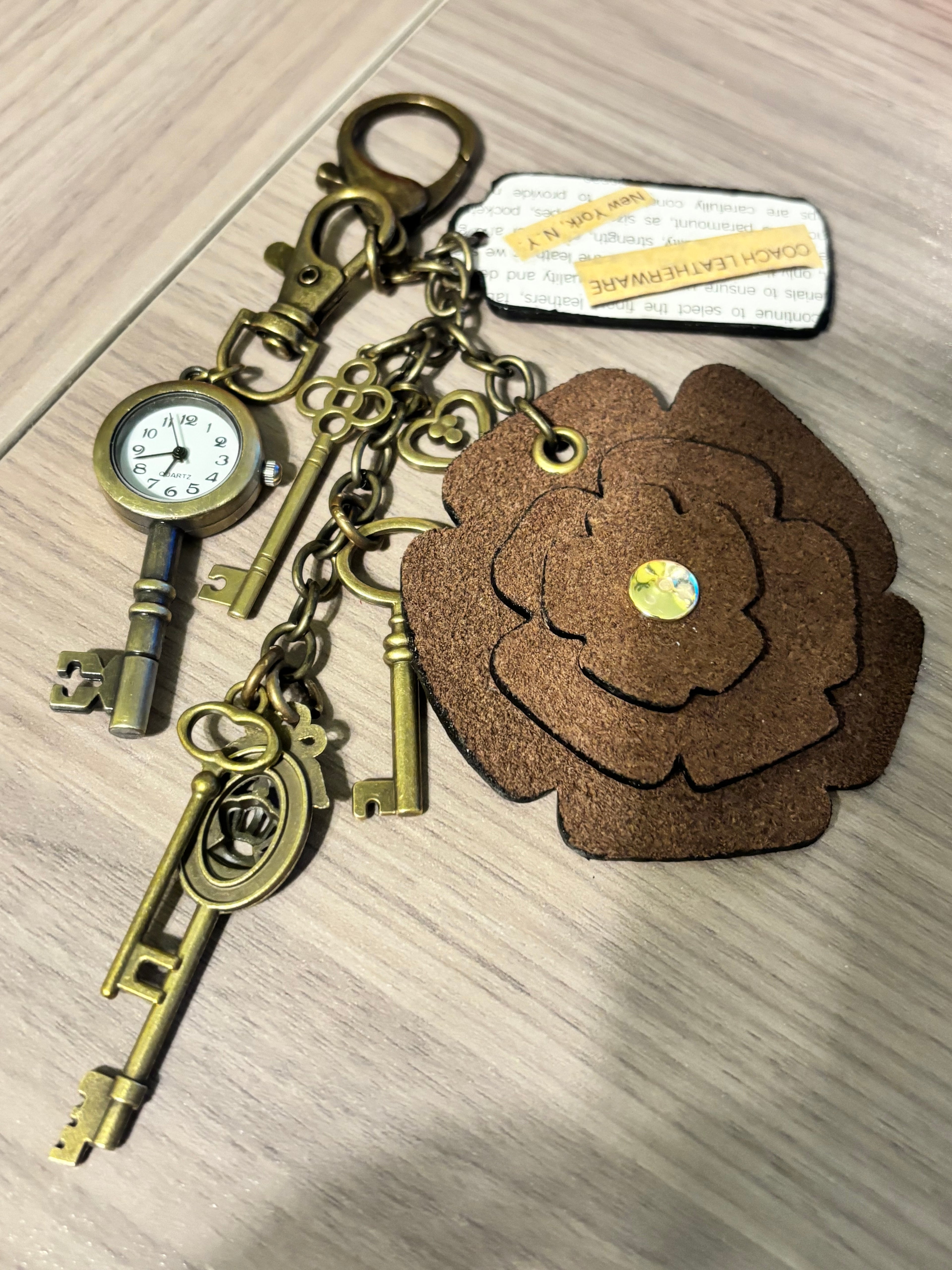 Handmade Upcycled Coach charm- Words-Brown Flower